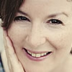 A woman smiling at the camera