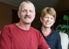 A photograph of a smiling couple.