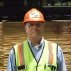 Man in safety gear at an industry plant.