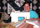 Tina Ihas  at her sewing machine