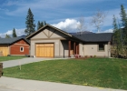 A photo of a modest home on Whiskey Jack Resort near Sparwood.
