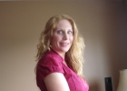 Rebecca Wilcox standing in her office