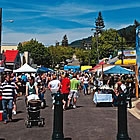 people gathering at a festival event in Creston, BC