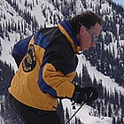 man skiing down a mountain in Nelson, BC