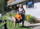 Maureen Uhrich & Henry Moscalenko sitting outside the resort