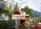 Roy and Leah Honkanen holding up a sign saying