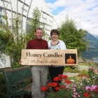Roy and Leah Honkanen holding up a sign saying