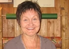 lady standing behind a counter in a store