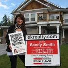 Photo of a Realtor and a home for sale
