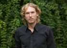 Rik Logtenberg standing in front of a tree