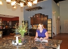 Genevieve Ridge  sitting at a table