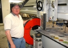 Man standing by granite slab