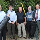 Photo of a group of people with an Fibre Optic Slice Closure