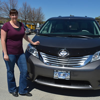 Young woman with a minivan