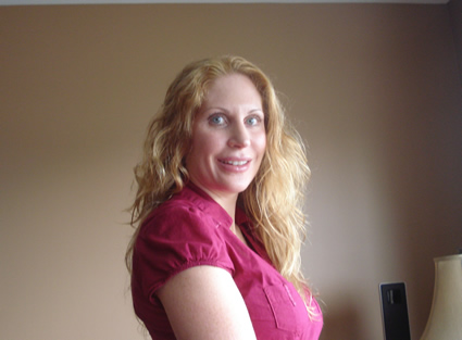 Rebecca Wilcox standing in her office