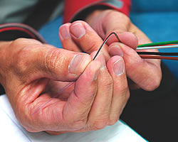 Man holding cables