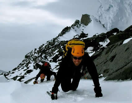 Person climbing on rocks