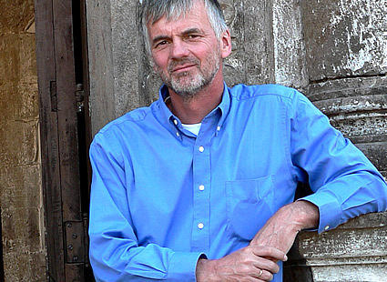 grey-haired man standing